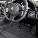 Electronic left foot accelerator